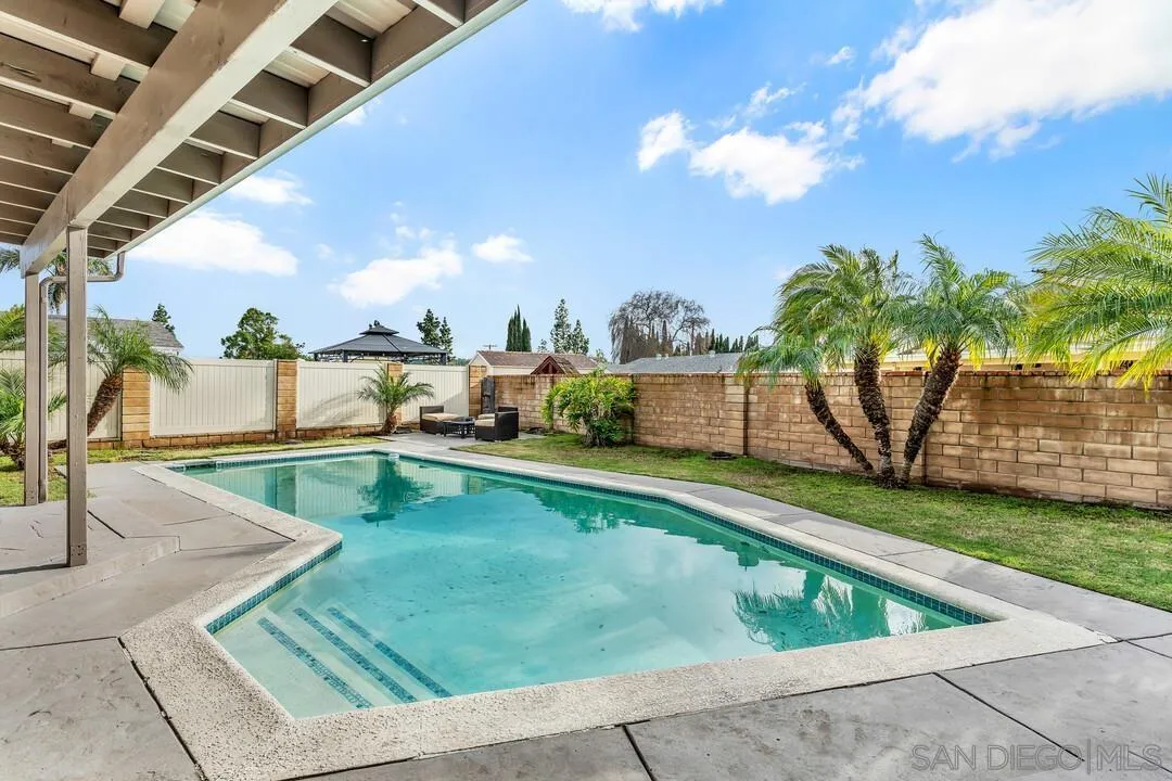9209 Arnaz Way Santee, CA 92071 - Photo 30 of 39 a view of swimming pool with outdoor seating