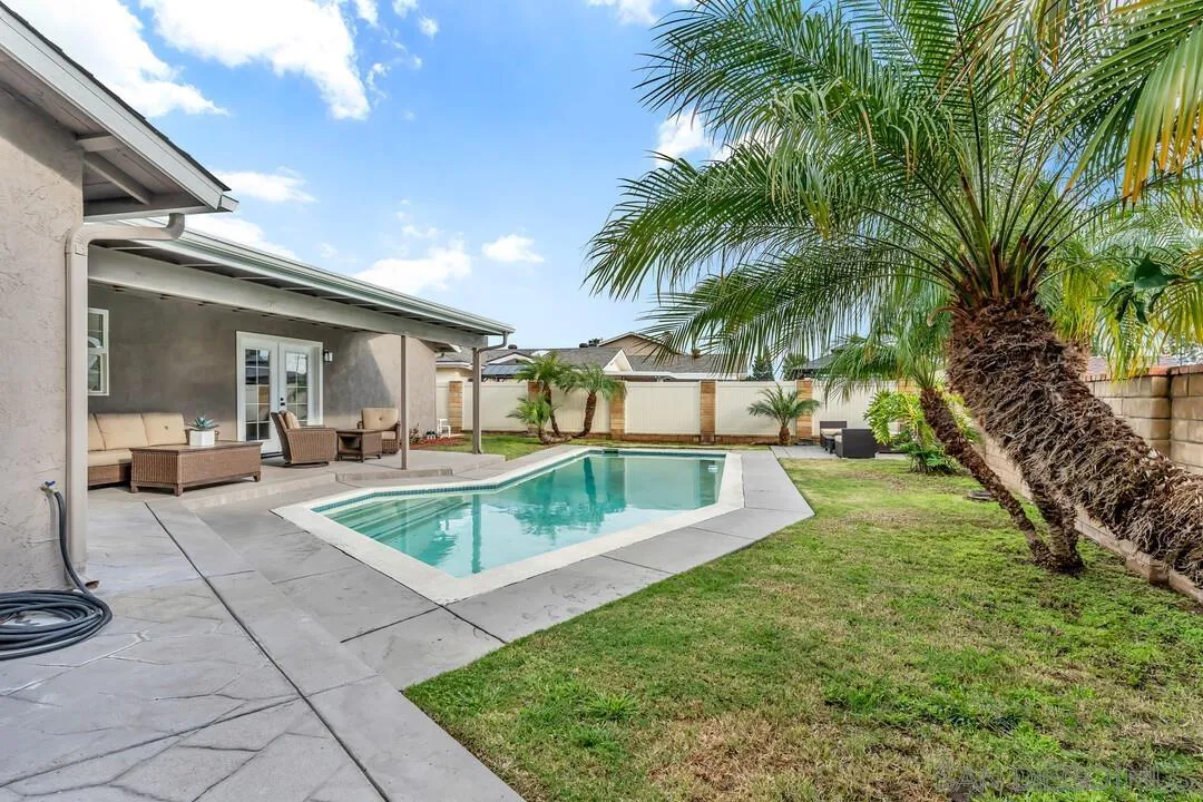 9209 Arnaz Way Santee, CA 92071 - Photo 31 of 39 a view of outdoor space yard deck patio and swimming pool