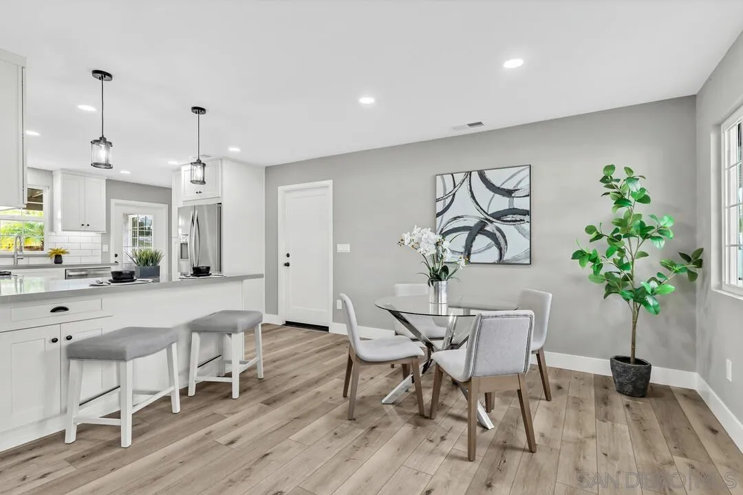 9209 Arnaz Way Santee, CA 92071 - Photo 7 of 39 a view of a dining room with furniture and chandelier
