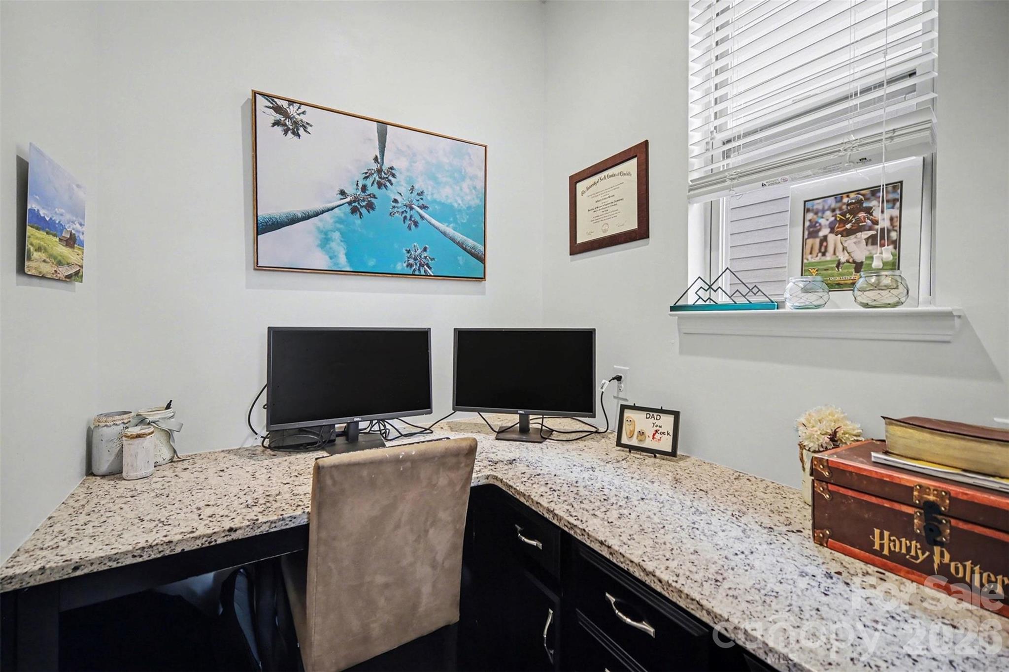 18314 McKee Road Charlotte, NC 28278 - Photo 11 of 37 a view of a workspace with furniture and wooden floor