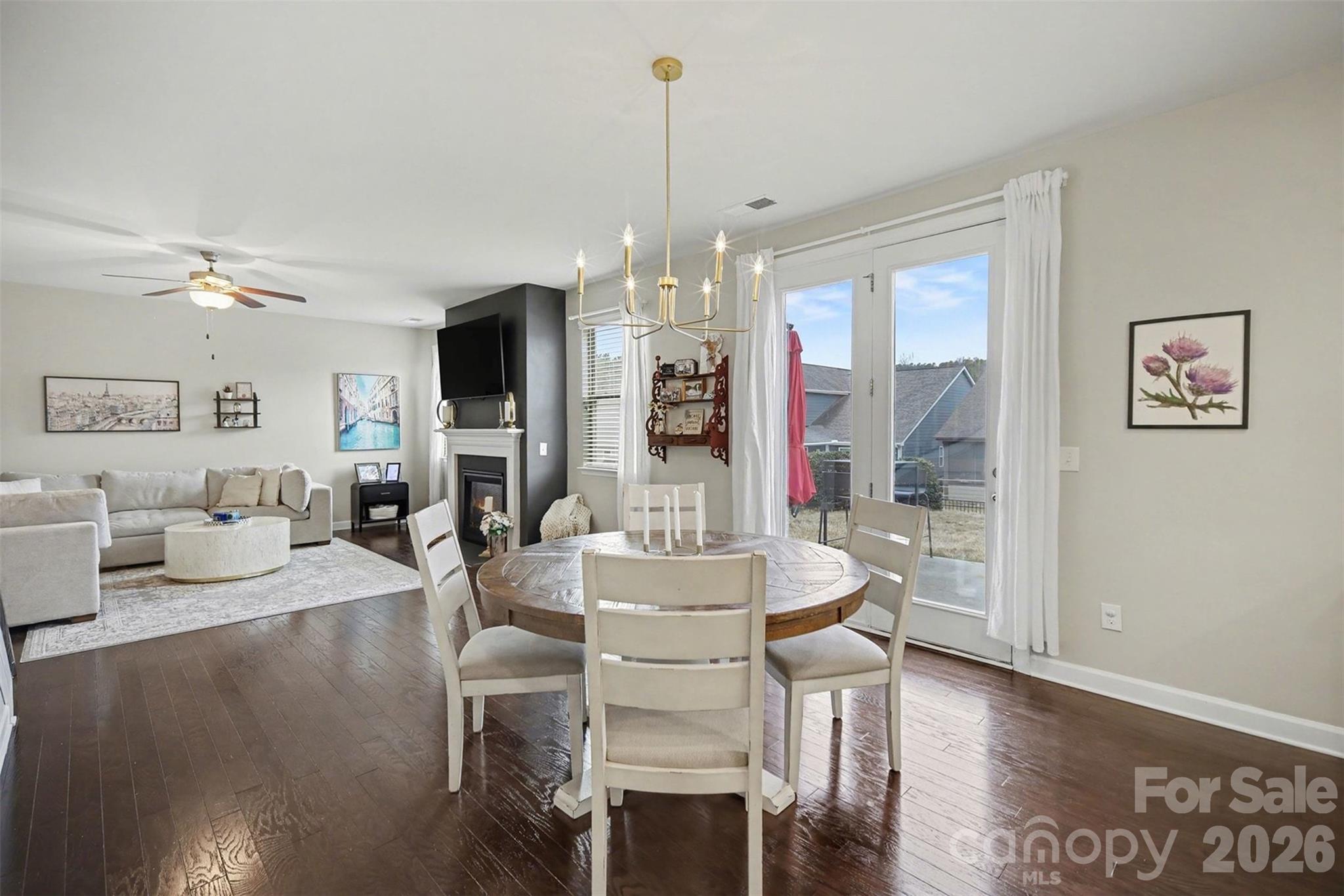 18314 McKee Road Charlotte, NC 28278 - Photo 13 of 37 a view of a dining room with furniture window and wooden floor
