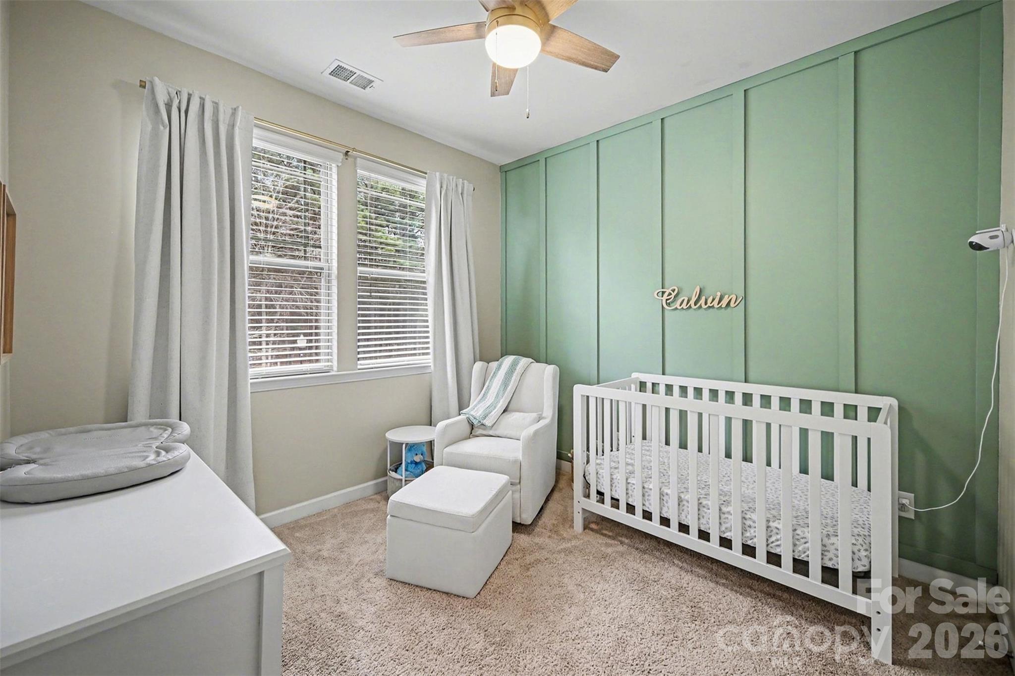 18314 McKee Road Charlotte, NC 28278 - Photo 27 of 37 a bedroom with a bed and window