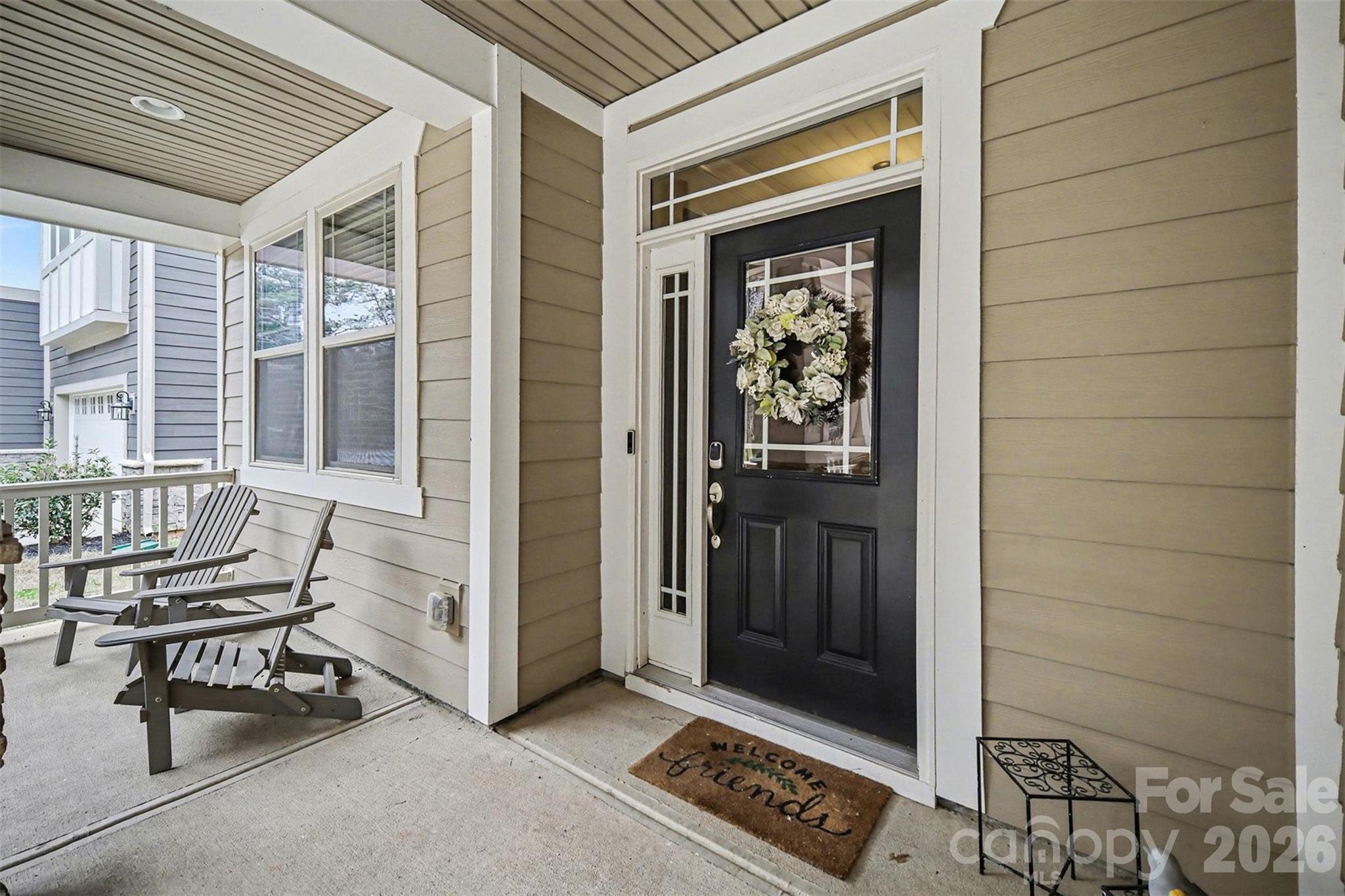 18314 McKee Road Charlotte, NC 28278 - Photo 3 of 37 a view of a entryway door of the house
