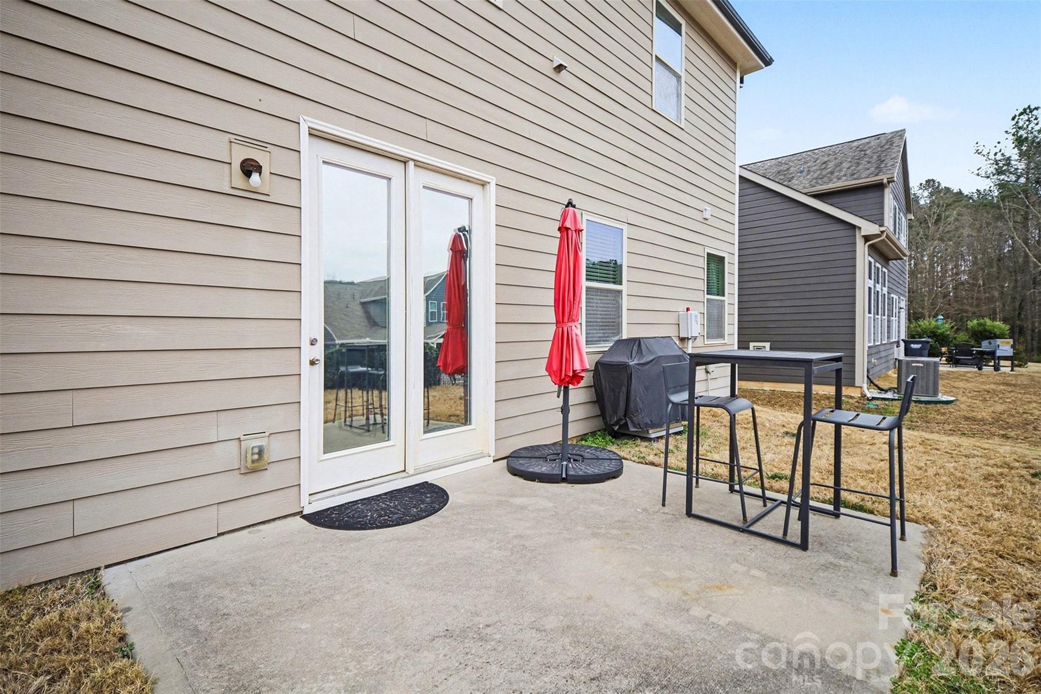 18314 McKee Road Charlotte, NC 28278 - Photo 31 of 37 a view of a patio with table and chairs and potted plants