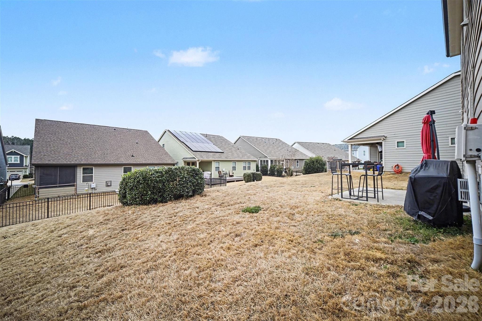 18314 McKee Road Charlotte, NC 28278 - Photo 32 of 37 a view of a house with backyard and sitting area