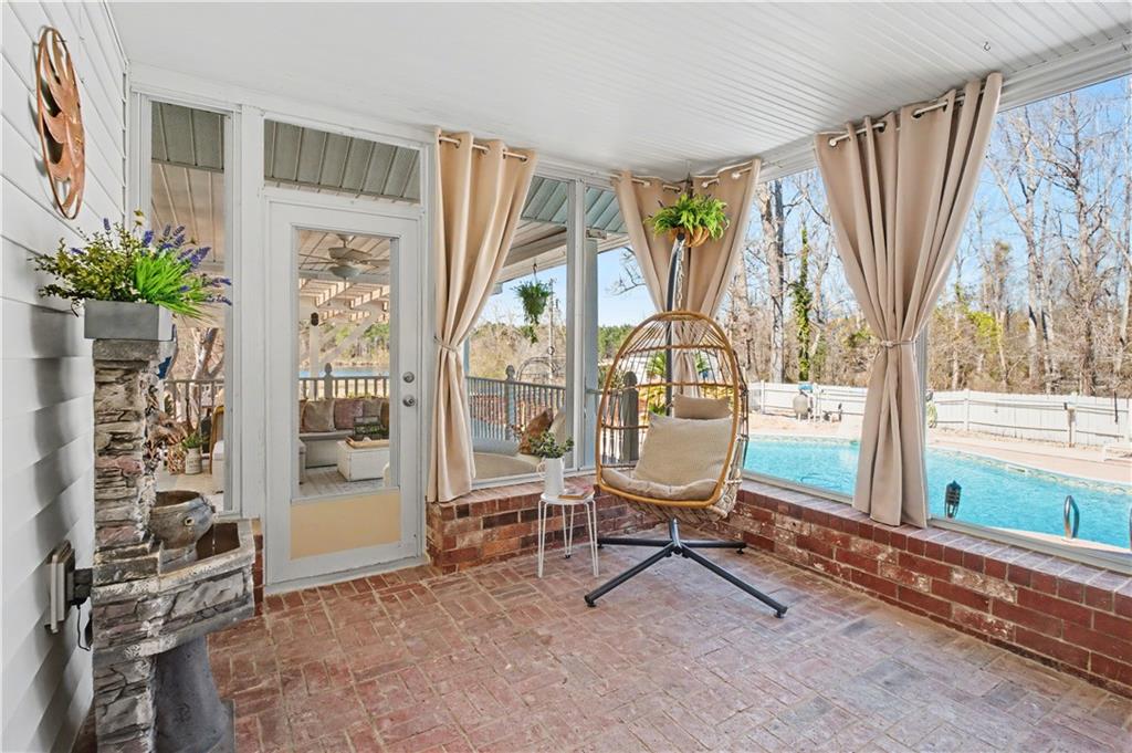 1833 Tom Odum Road Vidalia, GA 30474 - Photo 36 of 59 a view of a room with a large window and chair