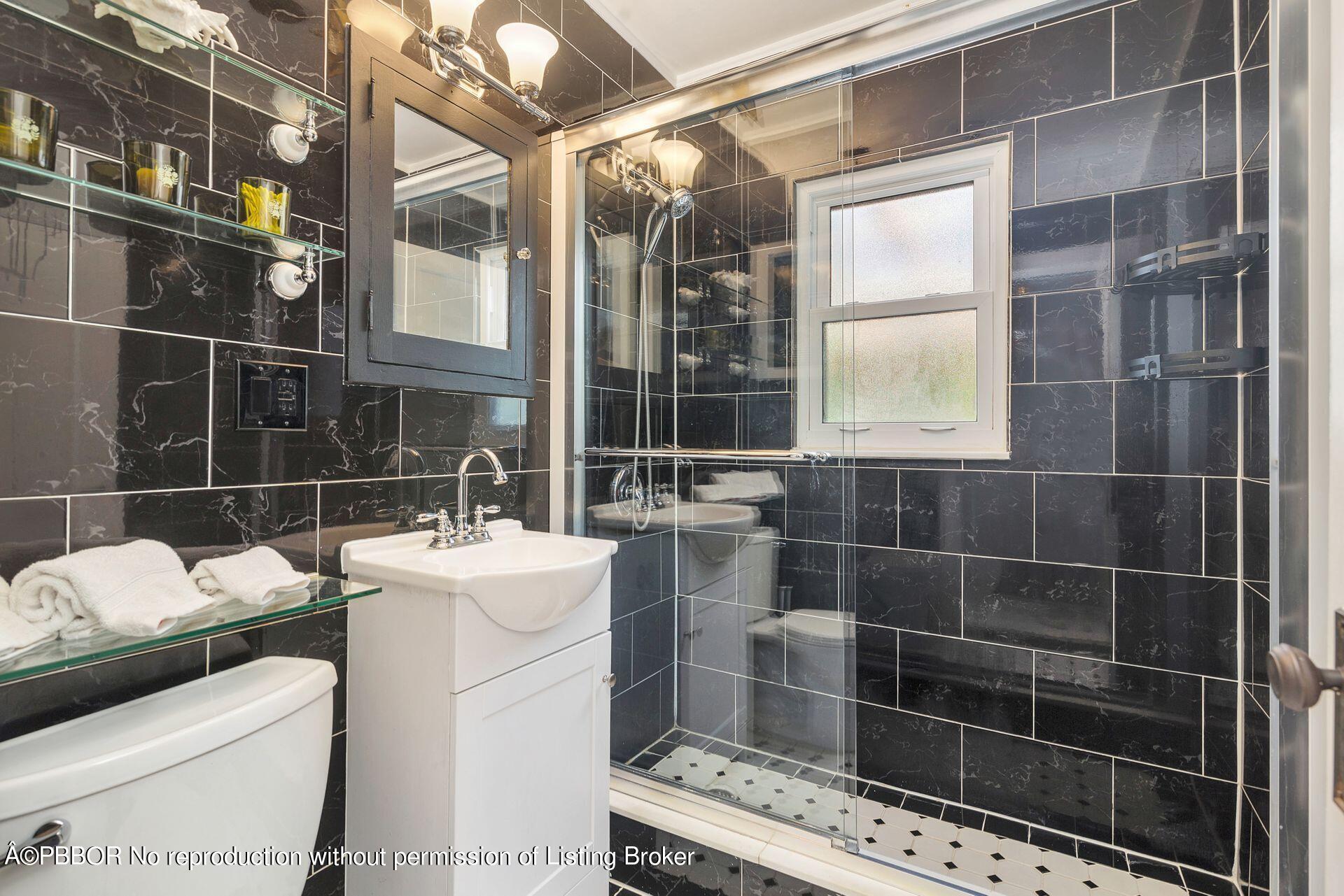 827 Ardmore Road West Palm Beach, FL 33401 - Photo 15 of 27 a bathroom with a sink toilet and shower