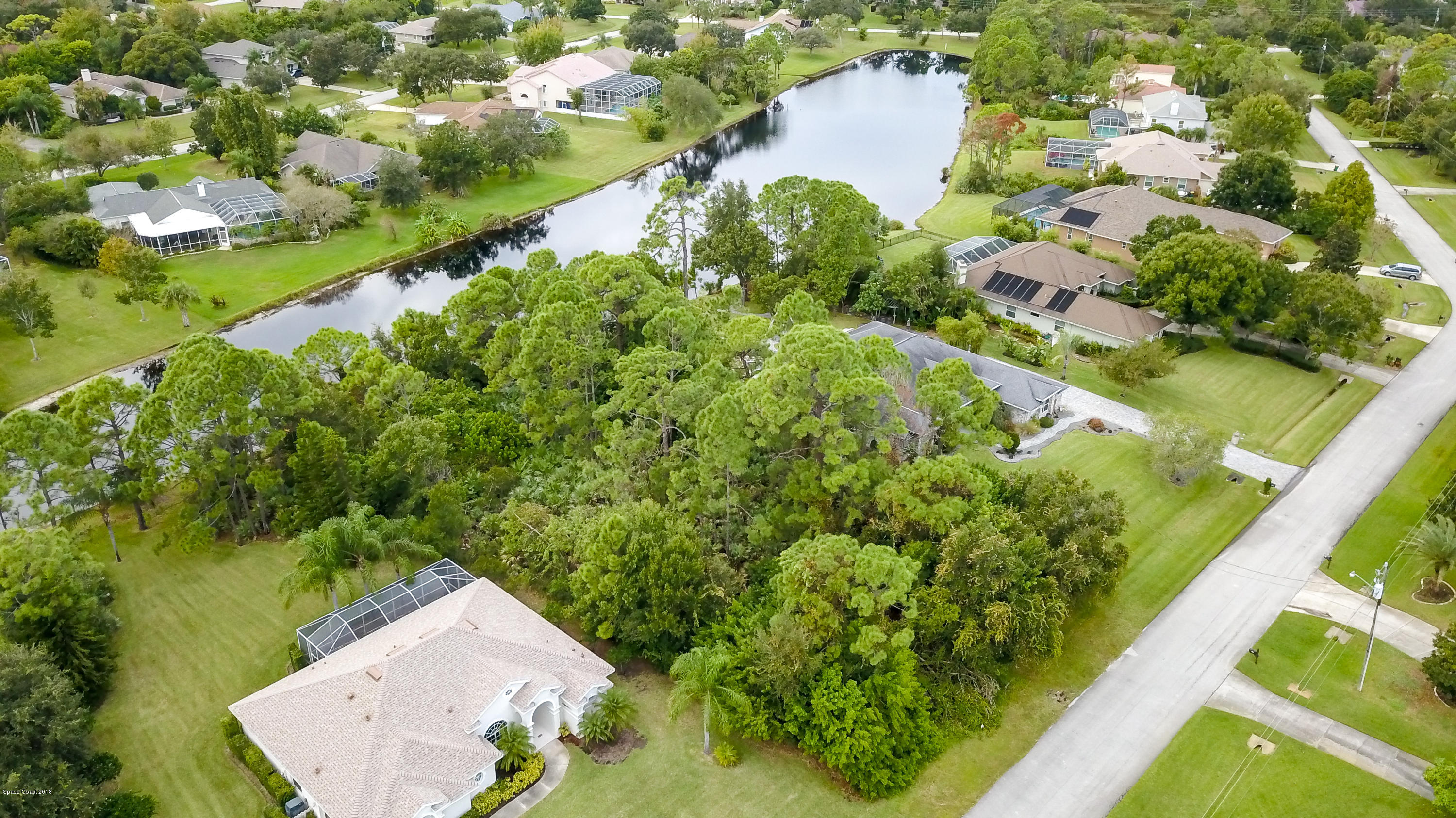 4424 Long Lake Road Melbourne, FL 32934 - Photo 2 of 10 View of property near lake