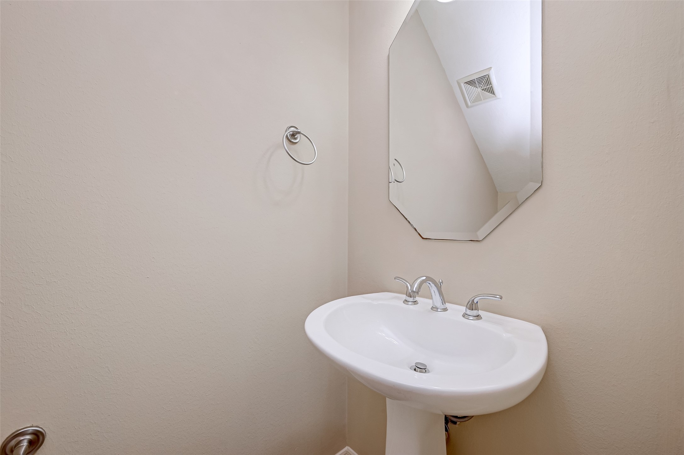 13607 Brookbluff Lane Houston, TX 77077 - Photo 29 of 50 a bathroom with a sink and a mirror