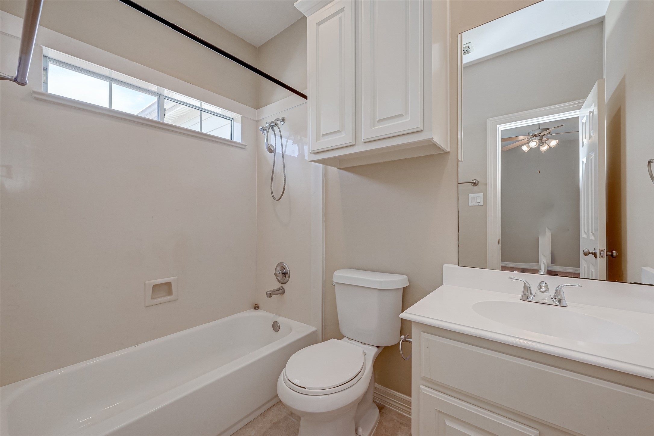 13607 Brookbluff Lane Houston, TX 77077 - Photo 35 of 50 a bathroom with a sink a toilet and a bathtub