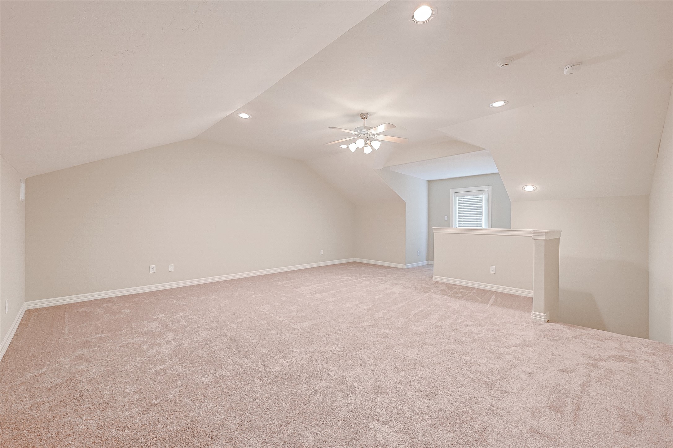 13607 Brookbluff Lane Houston, TX 77077 - Photo 47 of 50 a view of an empty room with a chandelier fan
