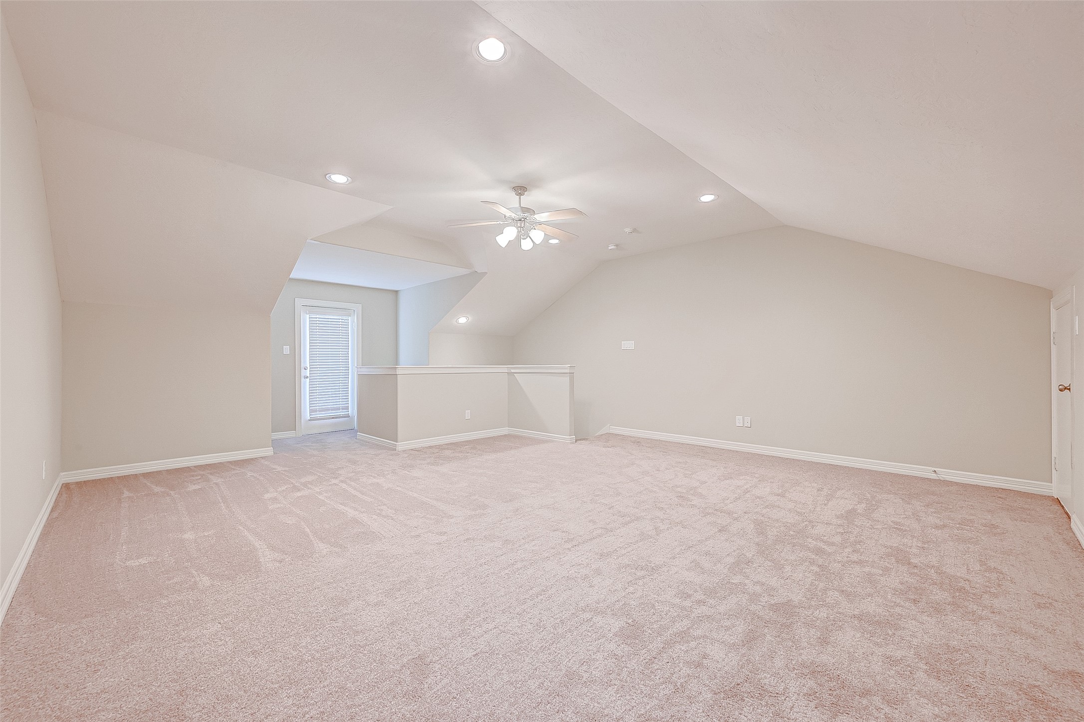 13607 Brookbluff Lane Houston, TX 77077 - Photo 48 of 50 a view of an empty room with a ceiling fan