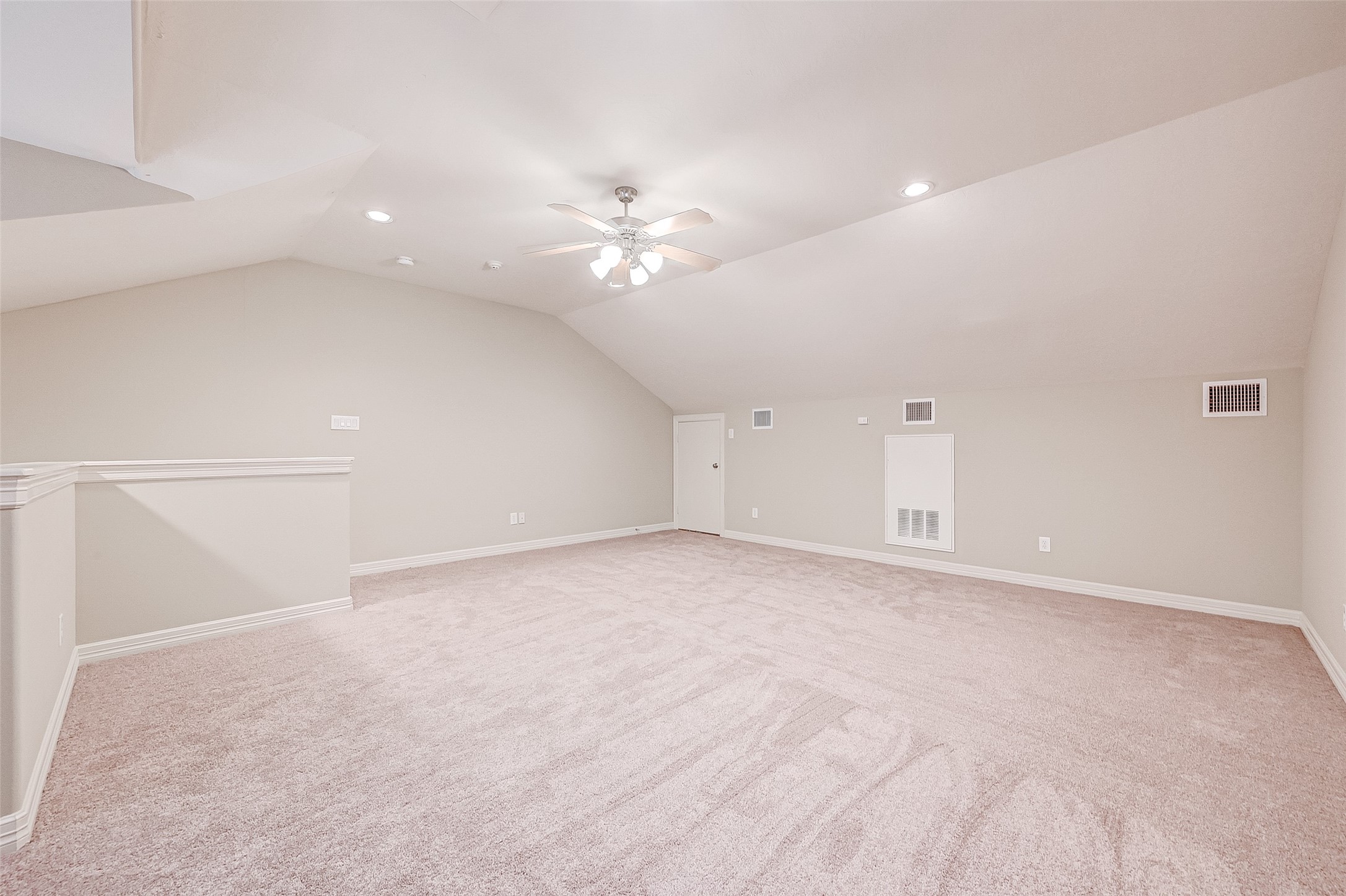 13607 Brookbluff Lane Houston, TX 77077 - Photo 49 of 50 an empty room with chandelier fan and closet area