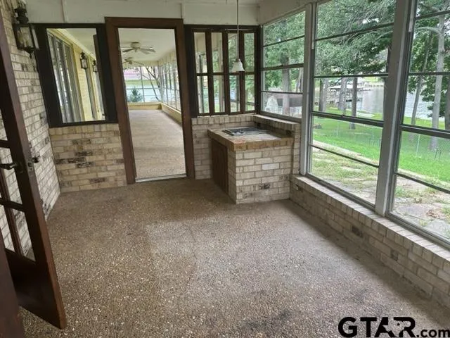 a view of an empty room and window