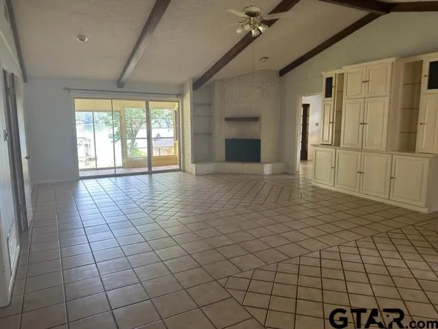 a view of an empty room and window