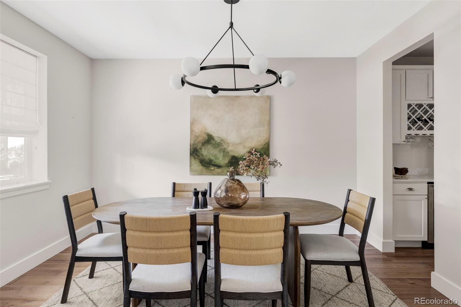 2908 Ironton Street Denver, CO 80238 - Photo 9 of 30 a dining room with furniture and window