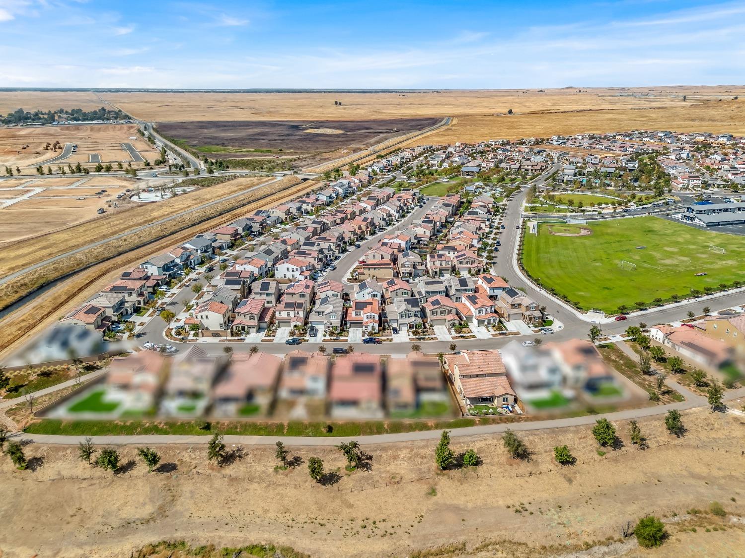4289 Vineyard Drive Madera, CA 93636 - Photo 35 of 37 an aerial view of residential building and ocean