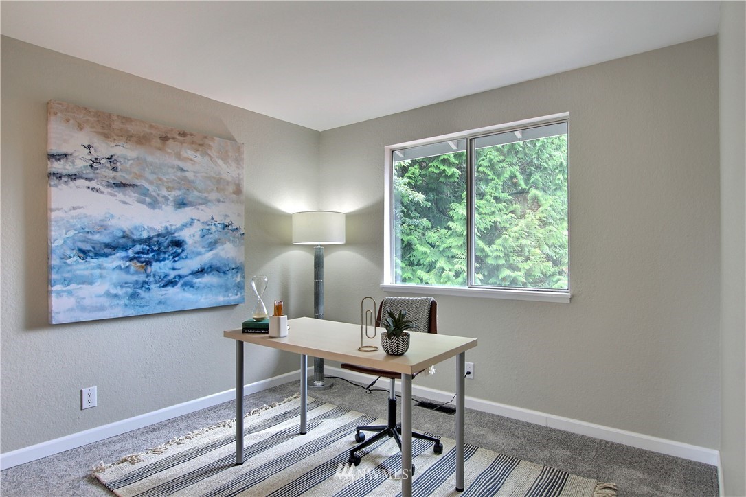 2327 168th Street Southeast Bothell, WA 98012 - Photo 17 of 25 a workspace with furniture and a window