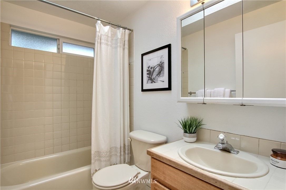 2327 168th Street Southeast Bothell, WA 98012 - Photo 20 of 25 a bathroom with a sink toilet and shower