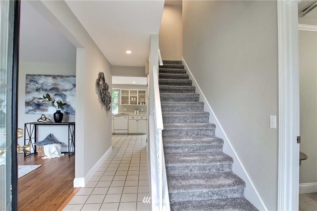 2327 168th Street Southeast Bothell, WA 98012 - Photo 3 of 25 a view of entryway and hall with wooden floor