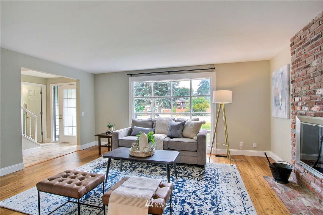 2327 168th Street Southeast Bothell, WA 98012 - Photo 7 of 25 a living room with furniture and a window