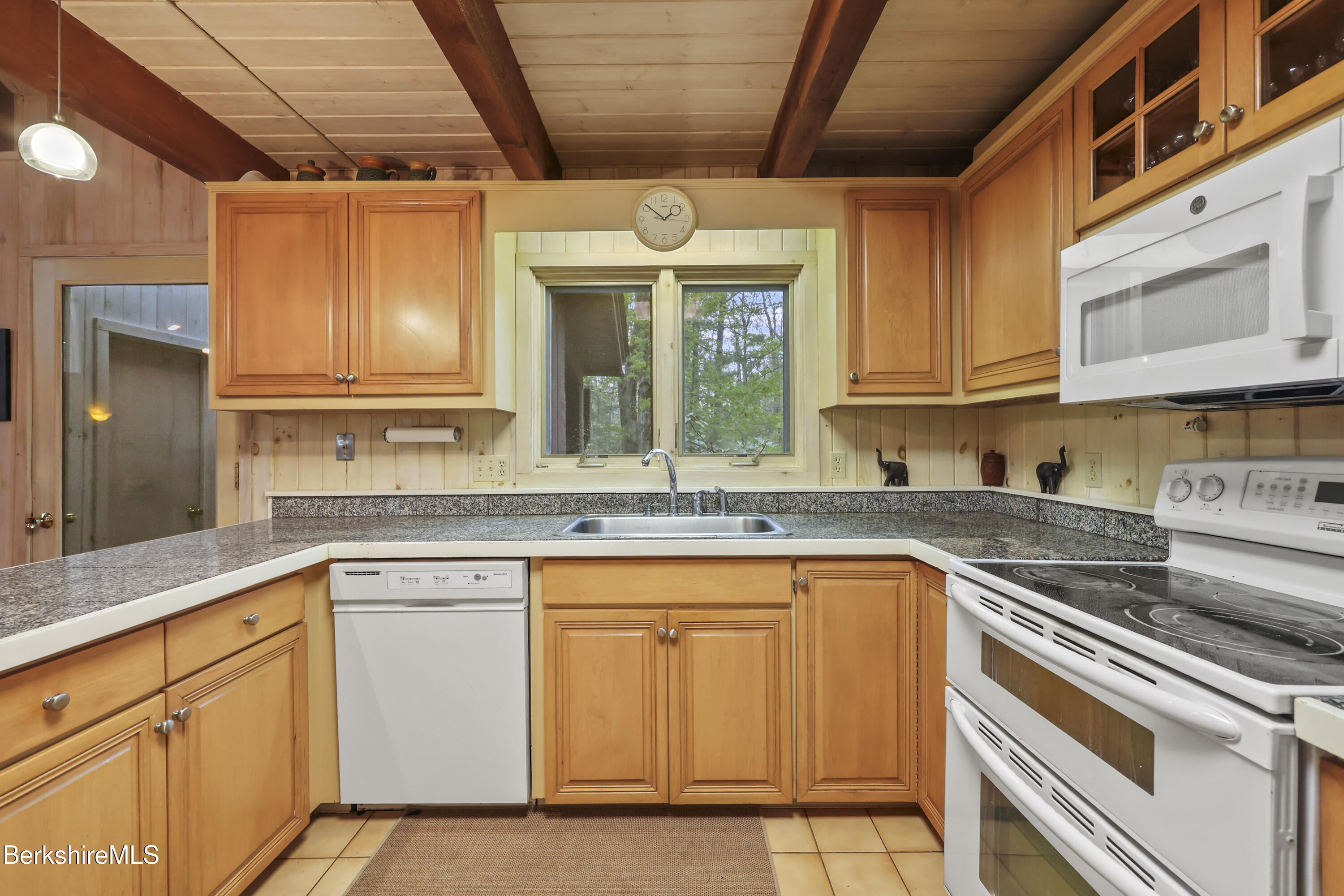 422 Bonny Rigg Hill Road Becket, MA 01223 - Photo 12 of 60 a kitchen that has a sink and a stove in it