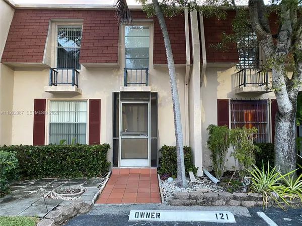 front view of house with a yard