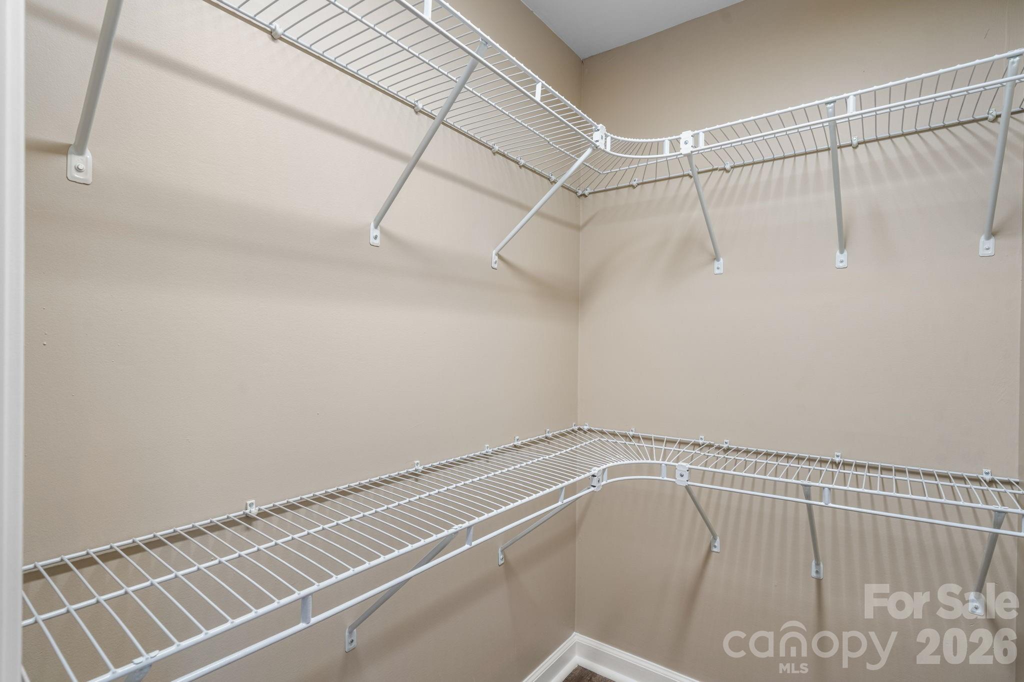 525 12th Street Southwest, Unit 30 Hickory, NC 28602 - Photo 12 of 22 a view of a room with racks on the wall