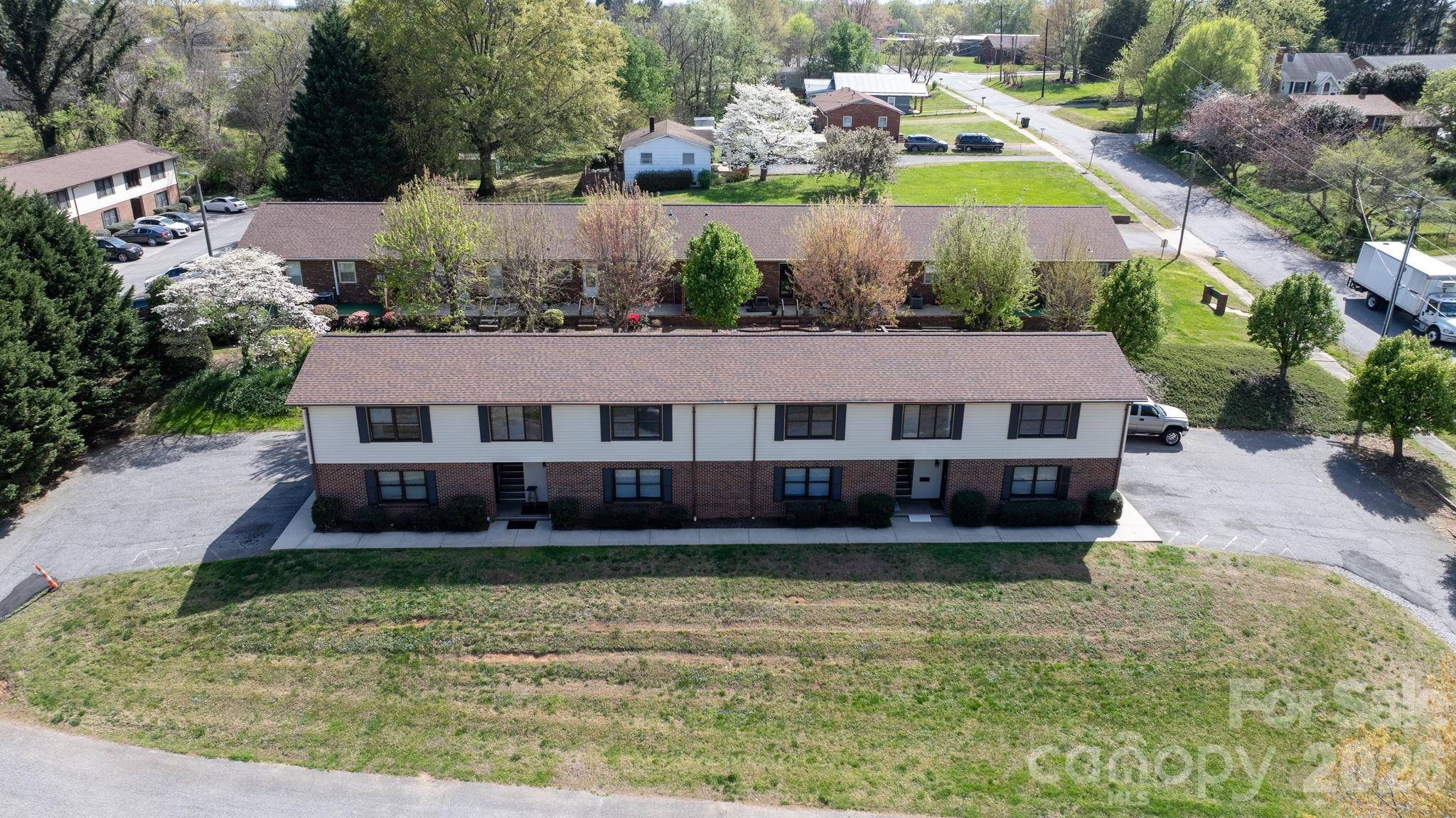 525 12th Street Southwest, Unit 30 Hickory, NC 28602 - Photo 19 of 22 a aerial view of a house with a swimming pool