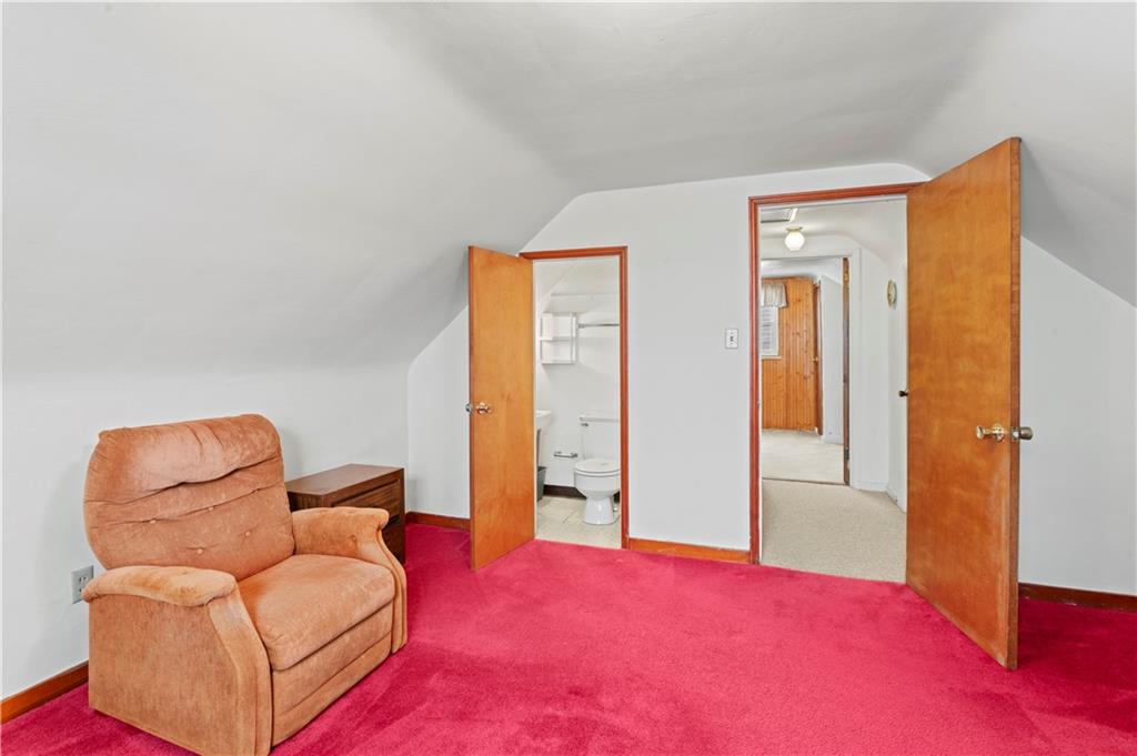 720 6th Street Verona, PA 15147 - Photo 21 of 28 a bedroom with furniture and a bed