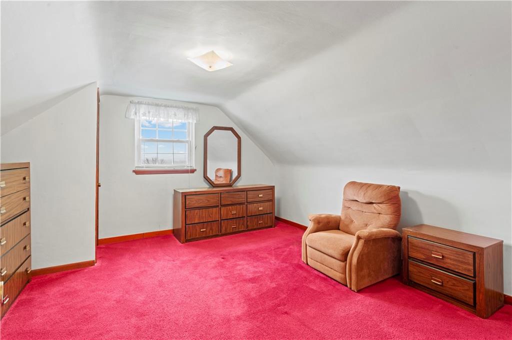 720 6th Street Verona, PA 15147 - Photo 22 of 28 a room with furniture and wooden floor