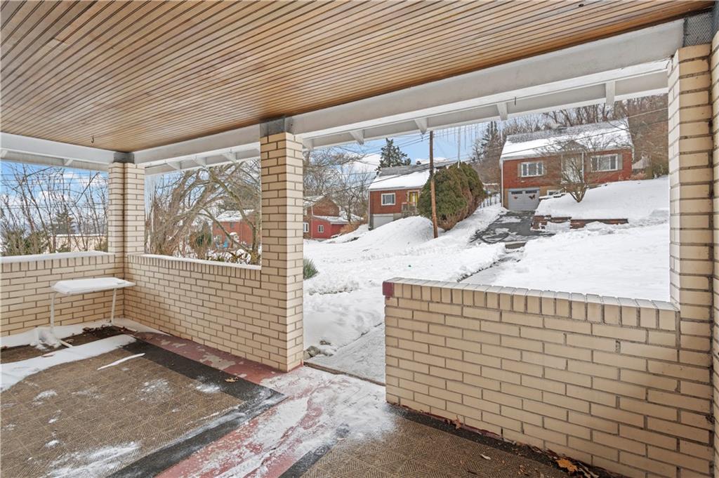720 6th Street Verona, PA 15147 - Photo 5 of 28 a view of a porch with furniture