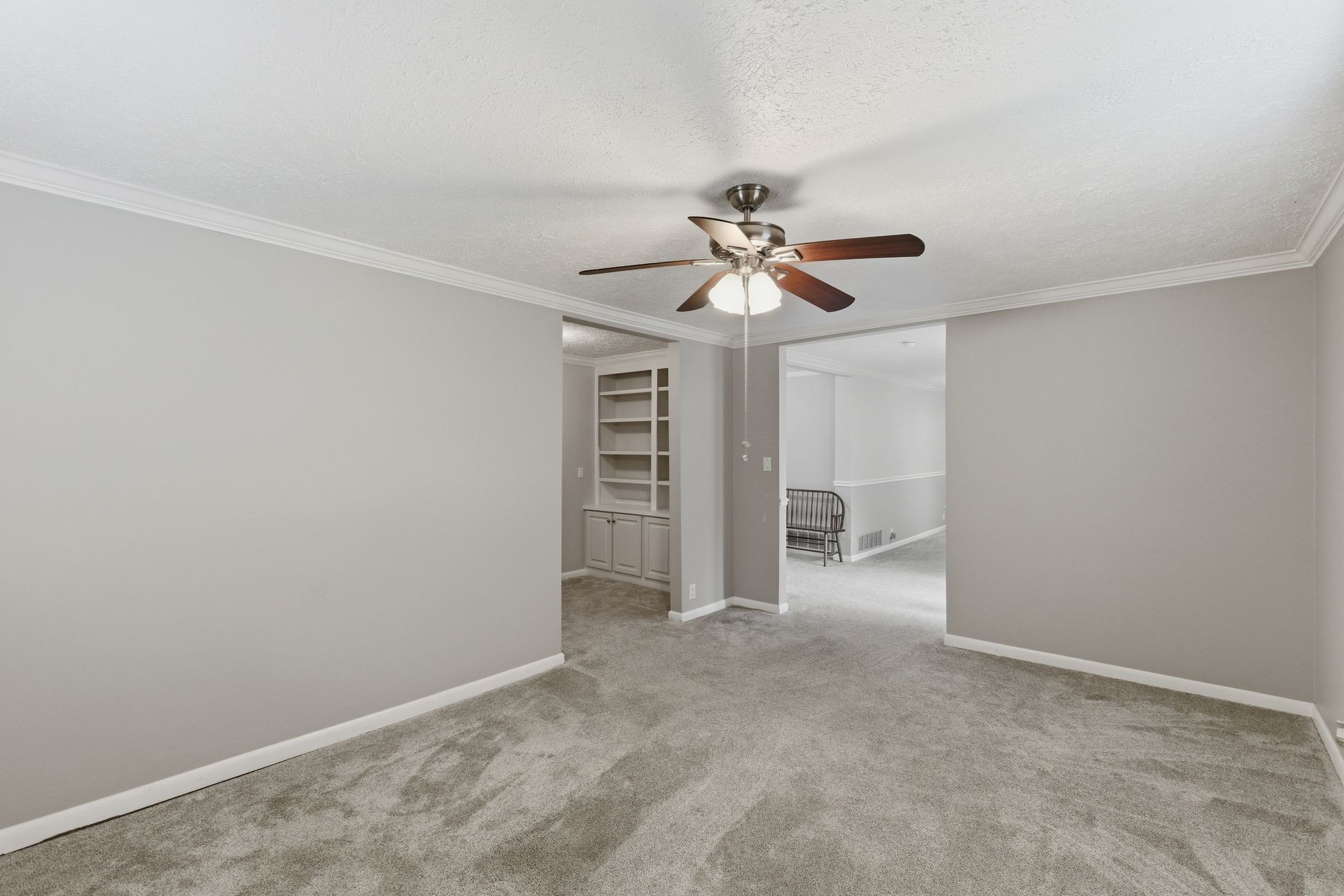 580 Defeated Creek Road Centerville, TN 37033 - Photo 9 of 71 a view of an empty room with a chandelier fan