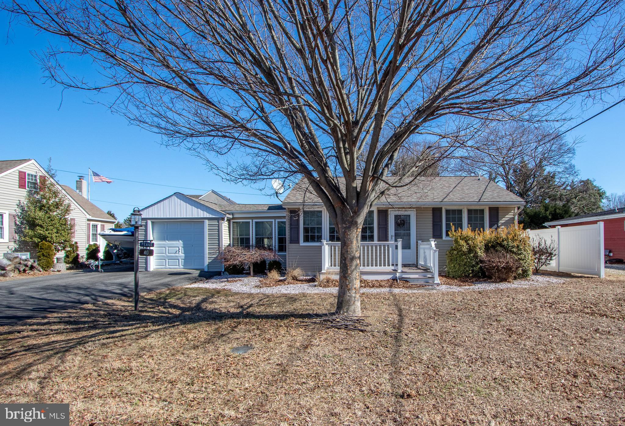 40 High Road Earleville, MD 21919 - Photo 1 of 42 a front view of a house with a yard