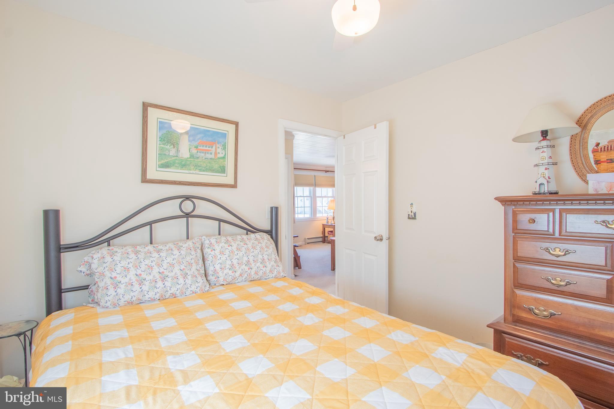 40 High Road Earleville, MD 21919 - Photo 16 of 42 a bedroom with a bed and a dresser