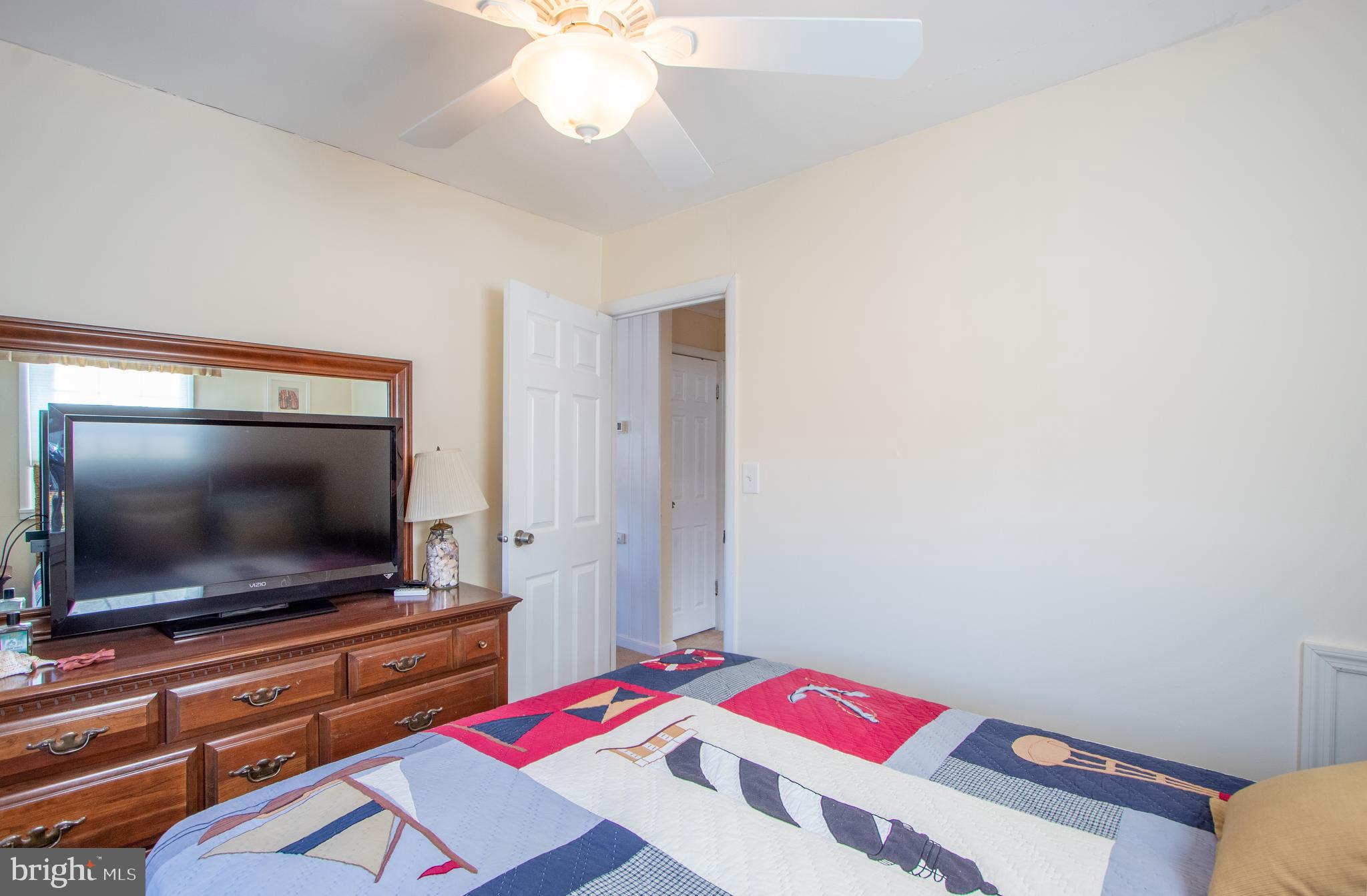 40 High Road Earleville, MD 21919 - Photo 19 of 42 a living room with furniture and a flat screen tv