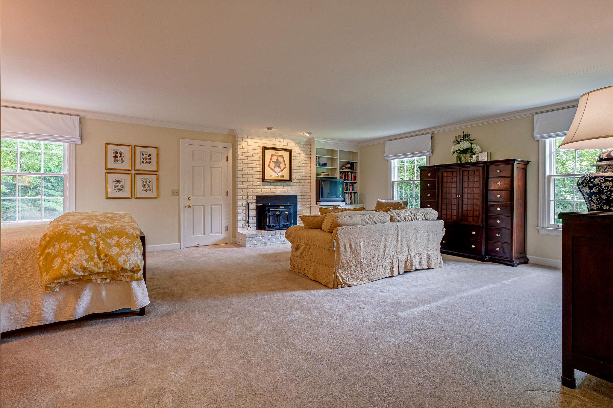 1005 Scramblers Knob Franklin, TN 37069 - Photo 17 of 29 a bed room with a bed and dresser