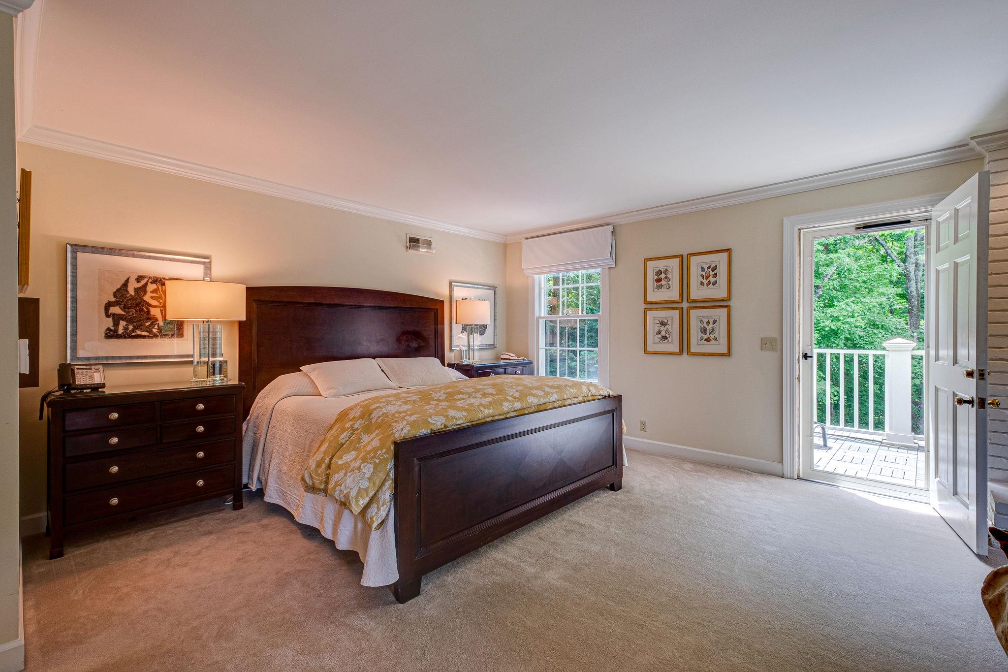 1005 Scramblers Knob Franklin, TN 37069 - Photo 18 of 29 a bedroom with a bed and painting on the wall