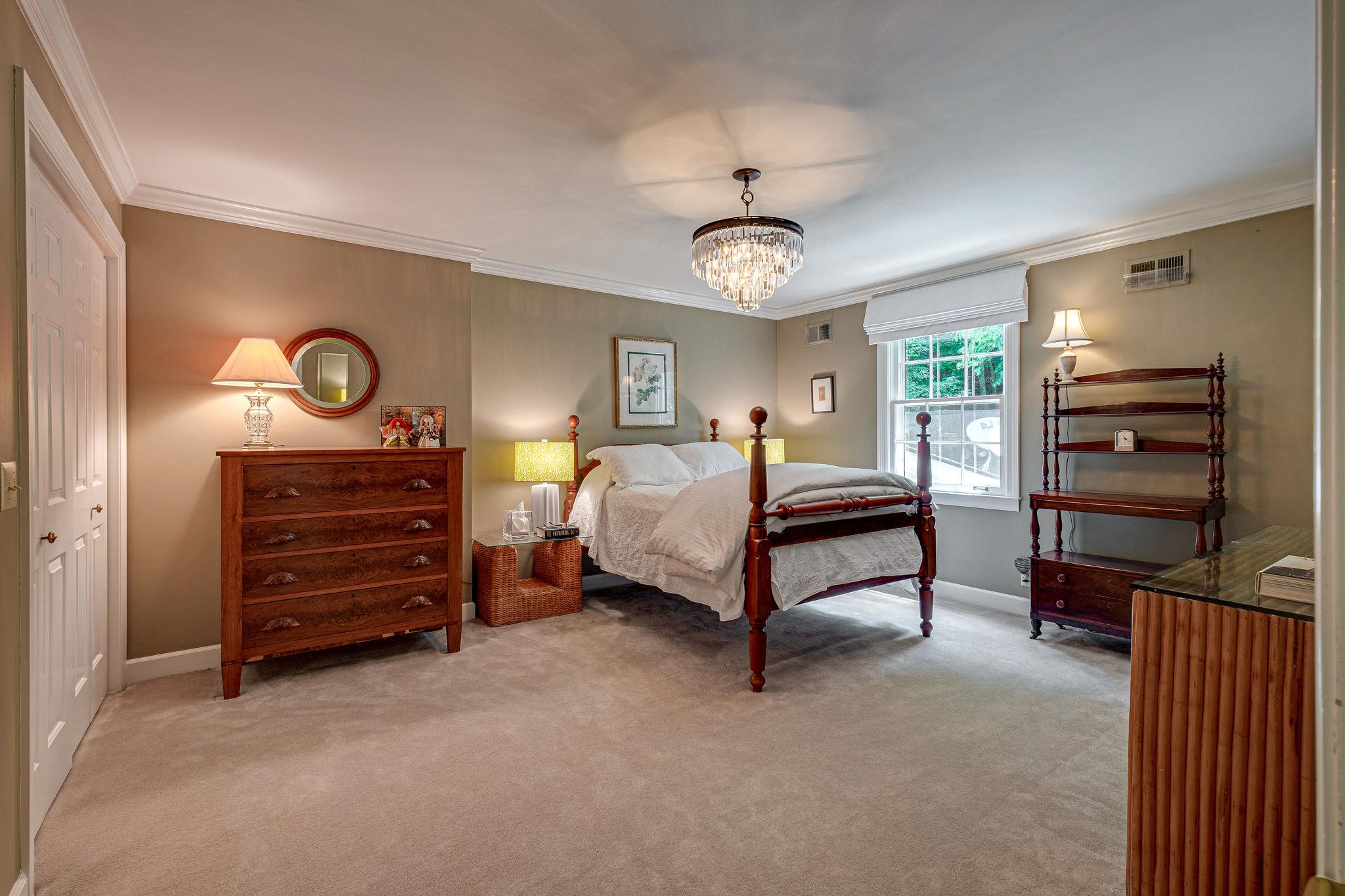 1005 Scramblers Knob Franklin, TN 37069 - Photo 21 of 29 a bedroom with a bed and cabinets