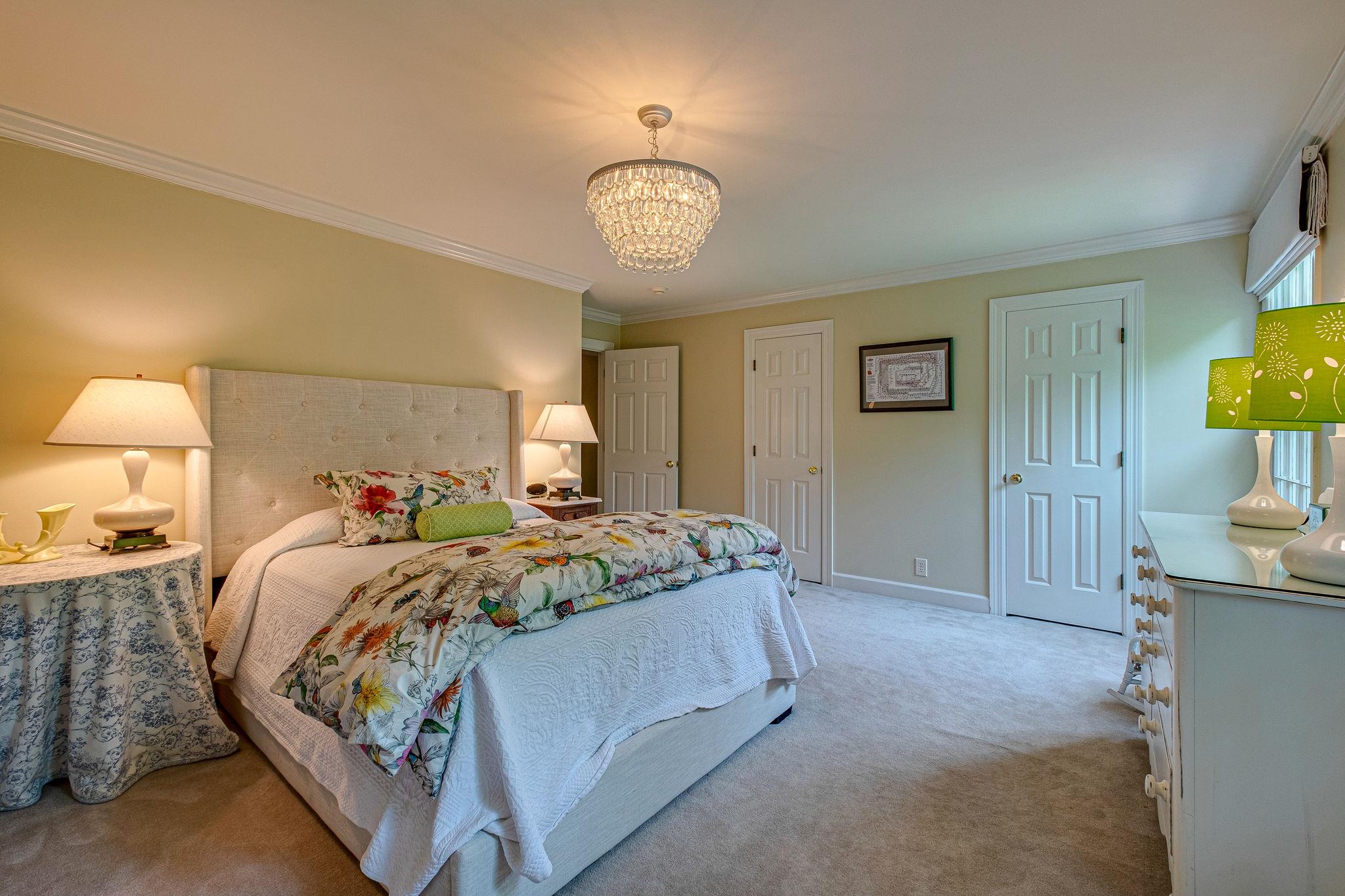 1005 Scramblers Knob Franklin, TN 37069 - Photo 22 of 29 a bed sitting in a spacious bedroom next to a lamp
