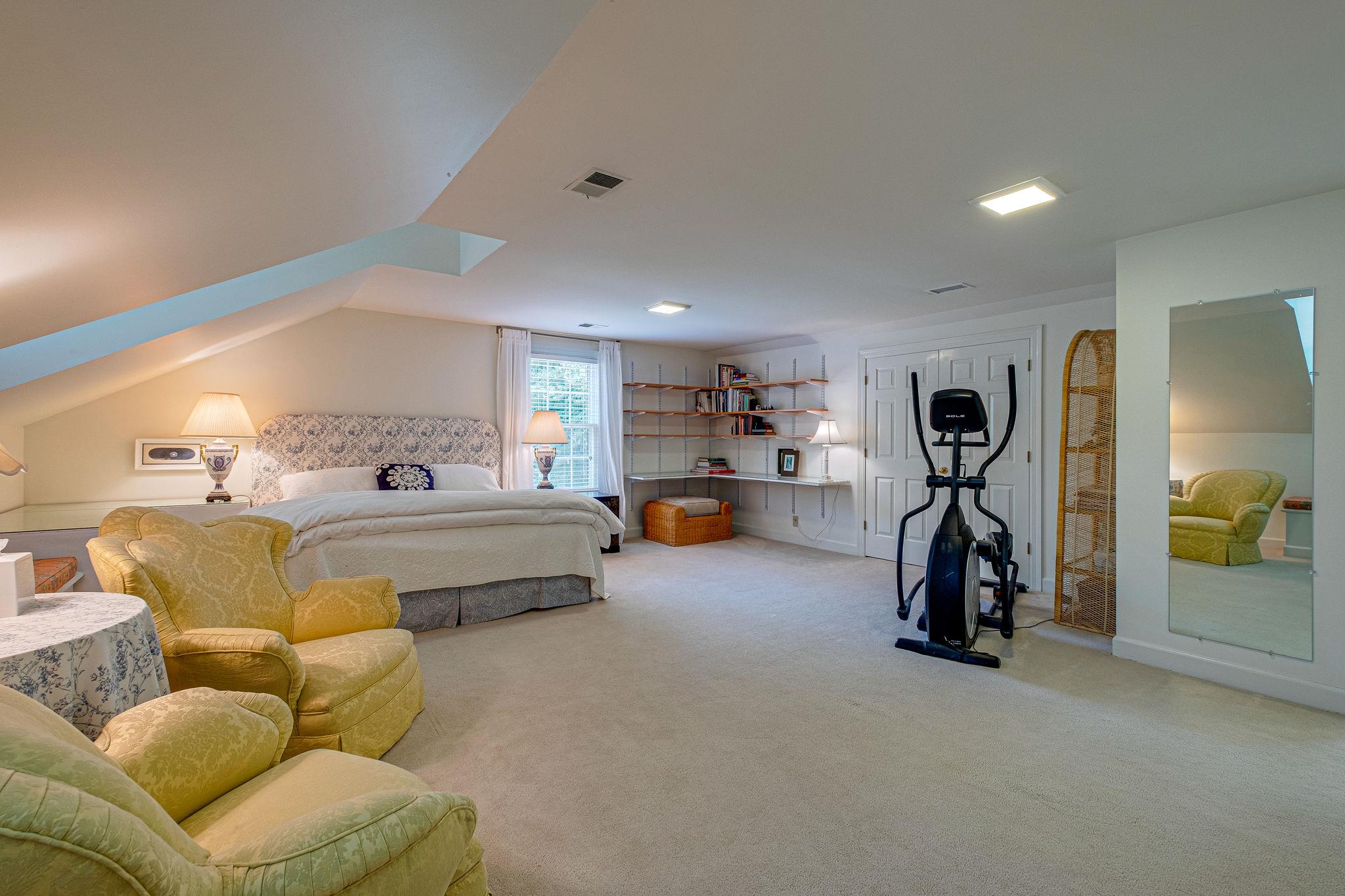 1005 Scramblers Knob Franklin, TN 37069 - Photo 23 of 29 a bedroom with furniture and a gym equipment