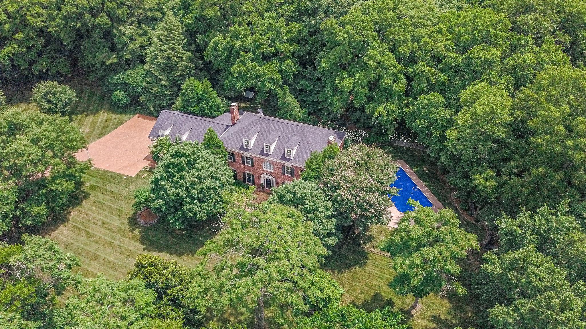 1005 Scramblers Knob Franklin, TN 37069 - Photo 3 of 29 an aerial view of house with yard and outdoor seating