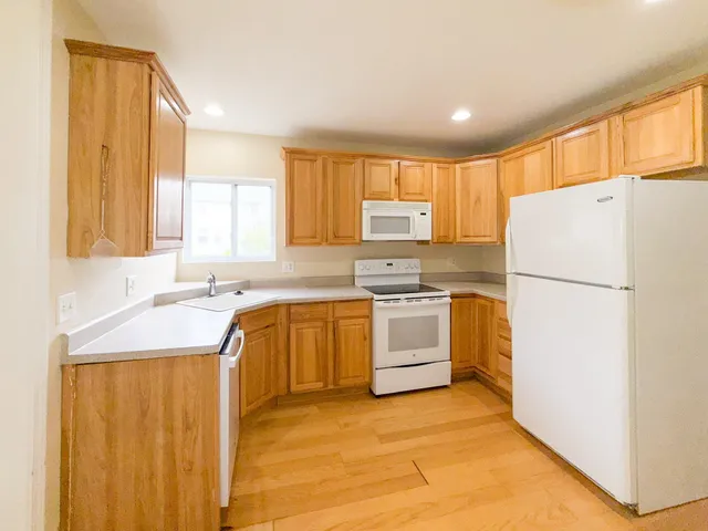 a view of a storage & utility room with a sink