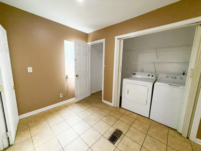 a bathroom with a tub and a sink