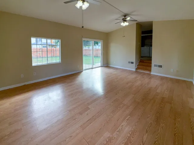 an empty room with windows