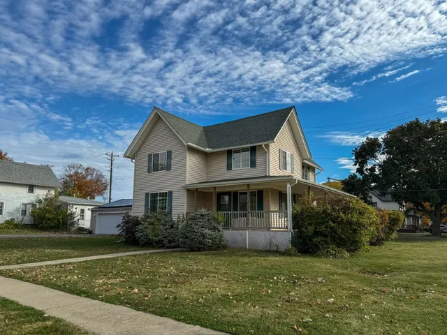 a house view with a garden space