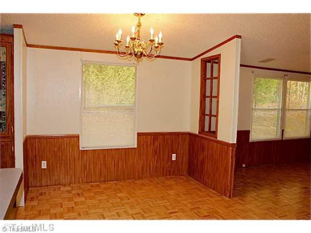 3846 Earnhardt Road Asheboro, NC 27205 - Photo 5 of 10 Dining Room. The kitchen opens to the dining area.