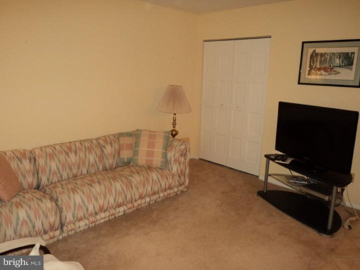20103 Delaire Landing Road, Unit 103 Philadelphia, PA 19114 - Photo 9 of 22 Living Room