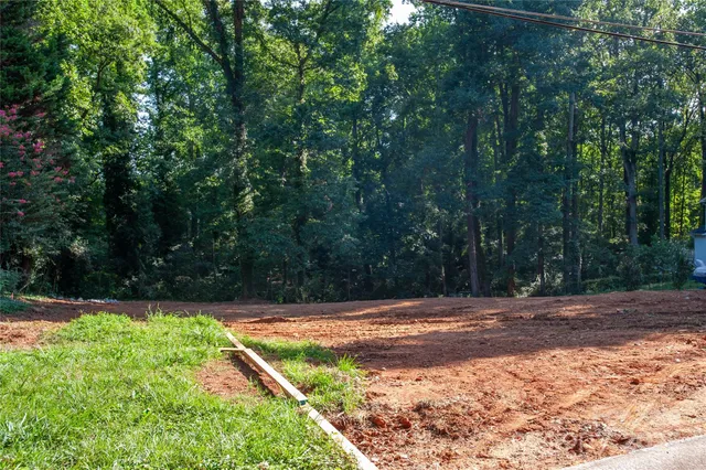 a view of a backyard of a house