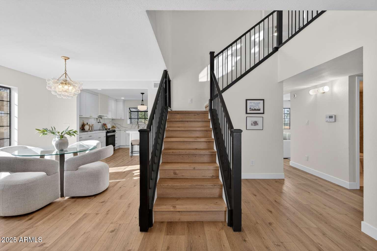 15850 North 15th Way Phoenix, AZ 85022 - Photo 18 of 43 a living room with furniture and a stairs